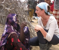 Our Executive Director speaks with a woman in Dhoobley, Somalia