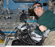 Ron Garan with the ISSAC sensor.